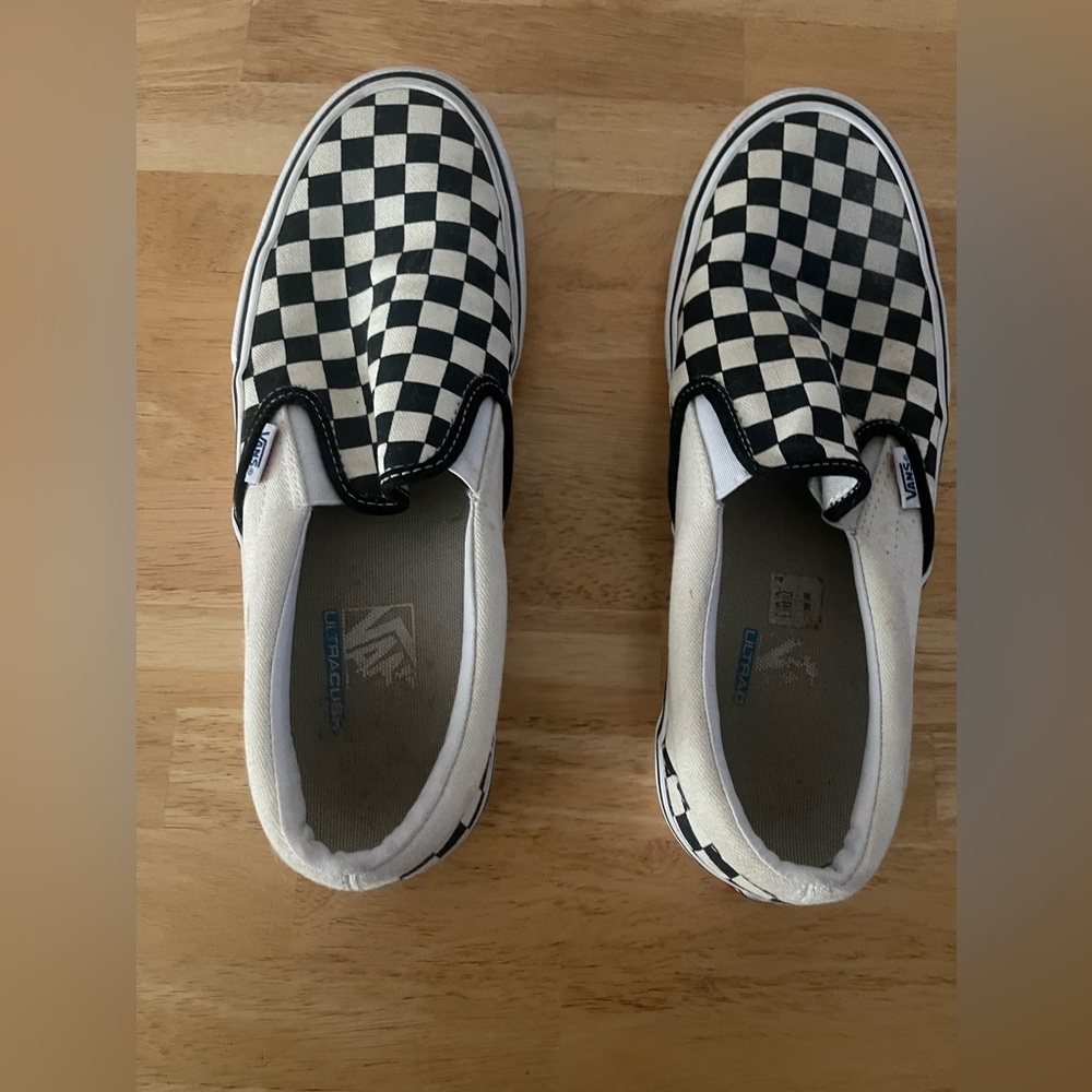 Vans checkered slip ons